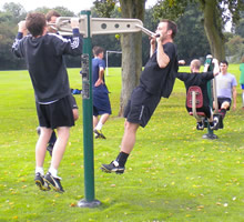 People using fitness equipment in Park Street Rec